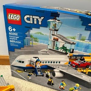 Lego passenger plane 60262. Used. There are 4 missing pieces check the photos.